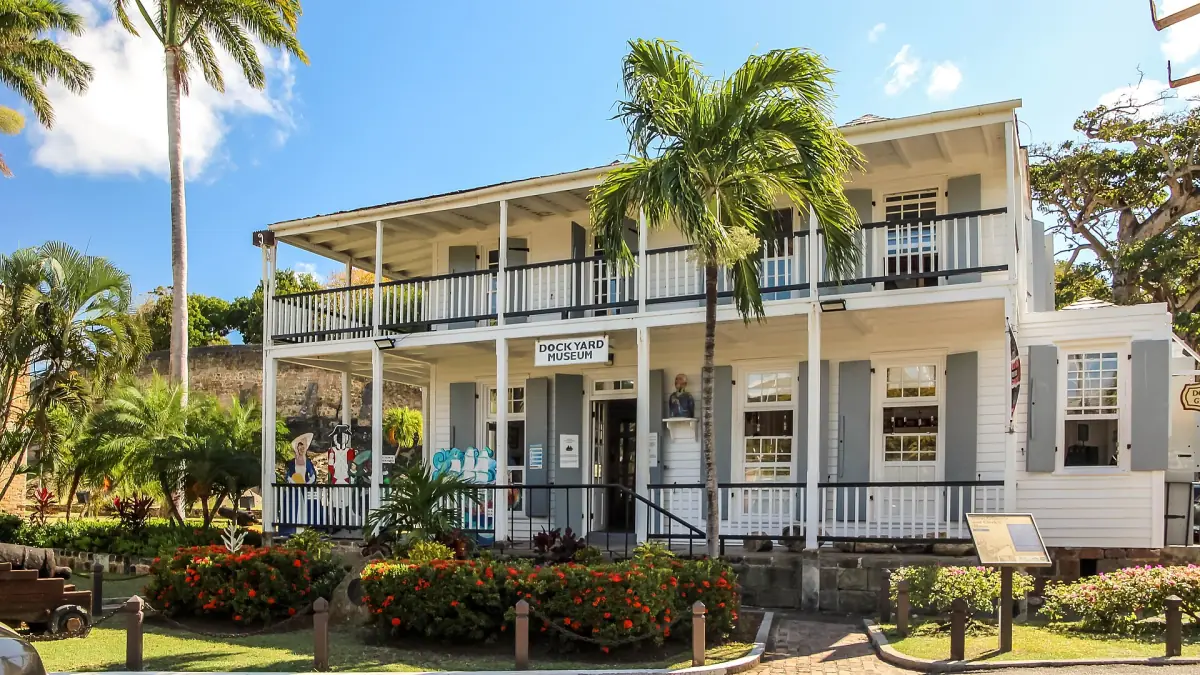 A verandah building among palms at Nelson's Dockyard